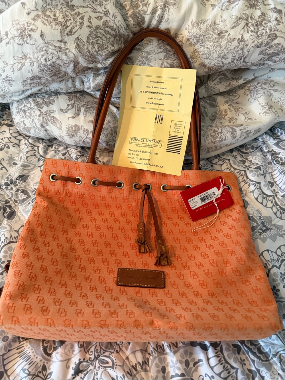Dooney & Bourke Orange Logo-Print Tote with Brown Leather Handles